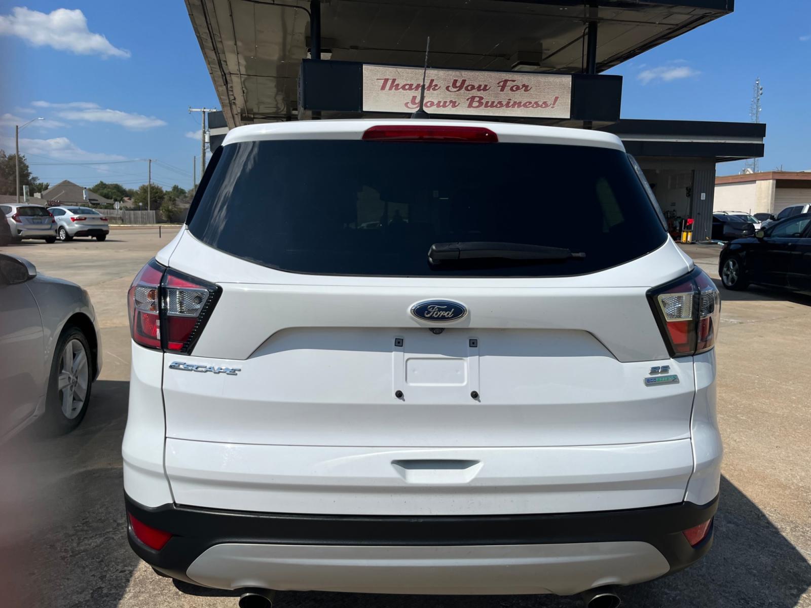 2017 Ford Escape SE FWD (1FMCU0GD2HU) with an 1.5L L4 DOHC 16V engine, 6A transmission, located at 8101 E. Skelly Dr., Tulsa, OK, 74129, (918) 592-3593, 36.121891, -95.888802 - Photo #3