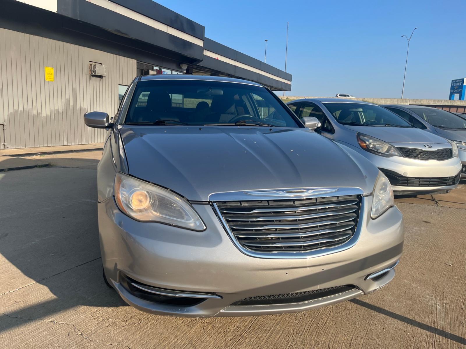 2013 Chrysler 200 LX (1C3CCBAB5DN) with an 2.4L L4 DOHC 16V engine, 6-Speed Automatic transmission, located at 8101 E. Skelly Dr., Tulsa, OK, 74129, (918) 592-3593, 36.121891, -95.888802 - Photo #0
