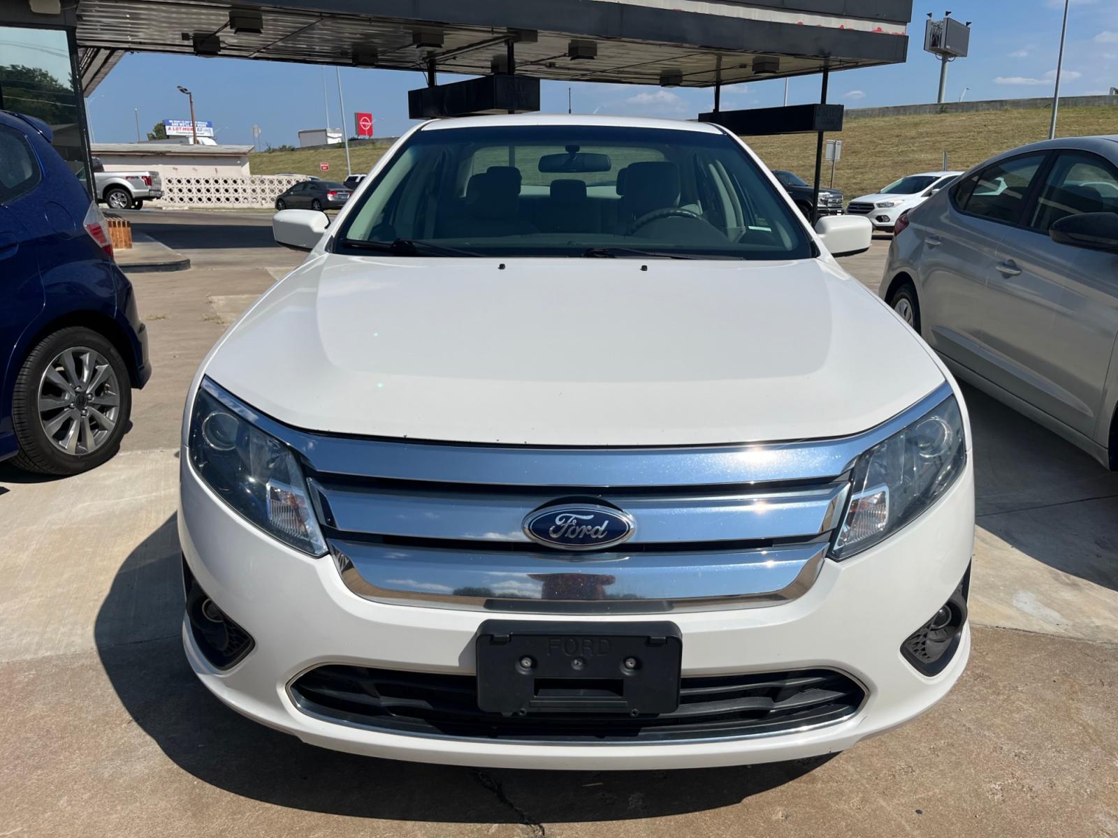 2012 Ford Fusion SE (3FAHP0HA2CR) with an 2.5L L4 DOHC 16V engine, located at 8101 E. Skelly Dr., Tulsa, OK, 74129, (918) 592-3593, 36.121891, -95.888802 - Photo #0