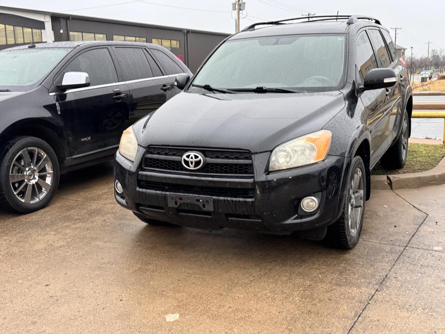 2011 BLACK Toyota RAV4 Sport I4 4WD (JTMRF4DV2B5) with an 2.4L L4 DOHC 16V engine, 4-Speed Automatic transmission, located at 8101 E. Skelly Dr., Tulsa, OK, 74129, (918) 592-3593, 36.121891, -95.888802 - Photo#0
