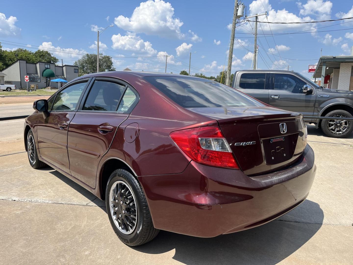 2012 MAROON Honda Civic LX Sedan 5-Speed AT (19XFB2F52CE) with an 1.8L L4 SOHC 16V engine, 5-Speed Automatic transmission, located at 8101 E. Skelly Dr., Tulsa, OK, 74129, (918) 592-3593, 36.121891, -95.888802 - Photo#1
