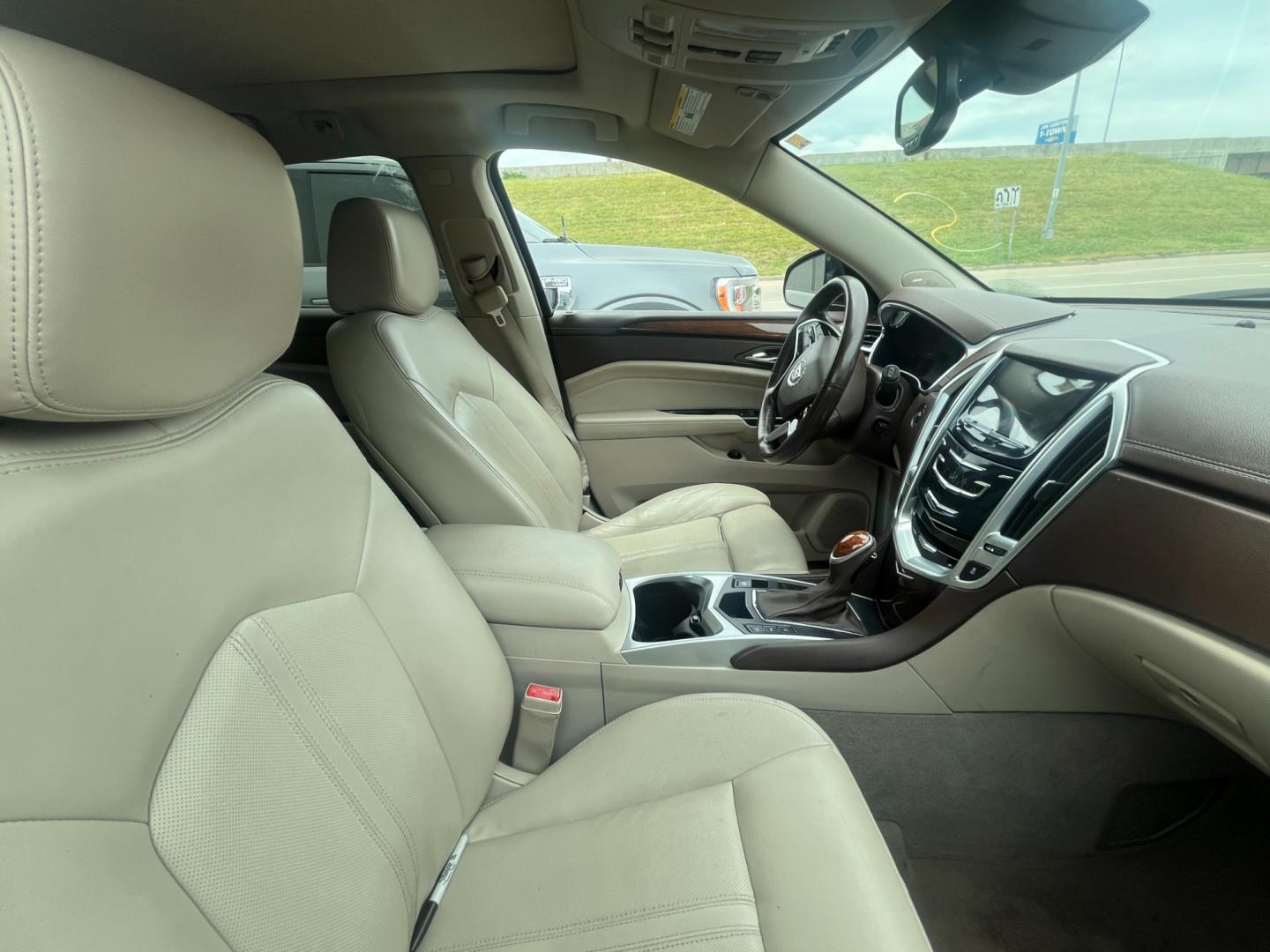 2014 BLACK Cadillac SRX Performance Collection AWD (3GYFNFE31ES) with an 3.6L V6 DOHC 24V FFV engine, 6-Speed Automatic transmission, located at 8101 E. Skelly Dr., Tulsa, OK, 74129, (918) 592-3593, 36.121891, -95.888802 - Photo#3