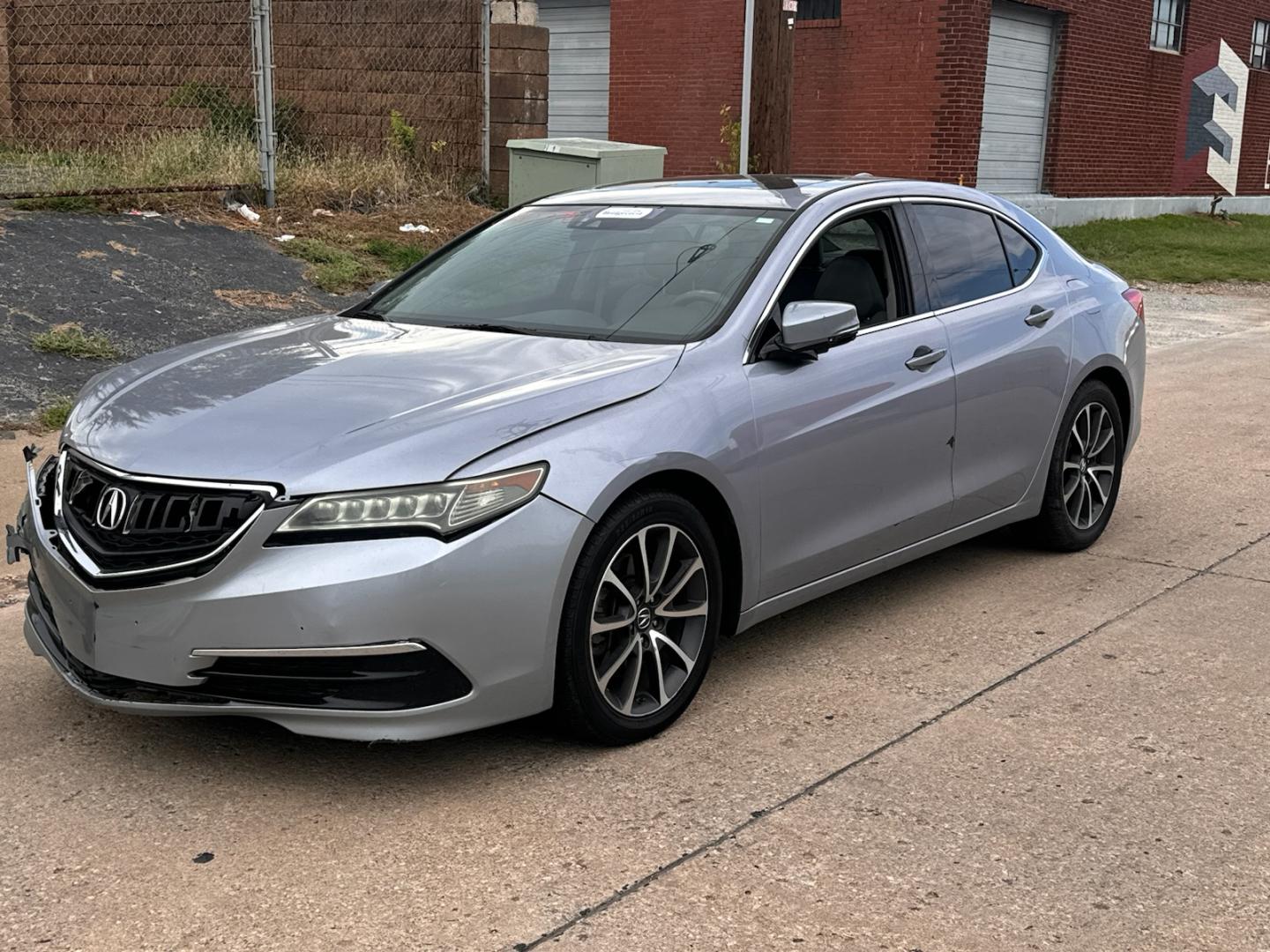 2015 SILVER Acura TLX 9-Spd AT w/Technology Package (19UUB2F56FA) with an 3.5L V6 SOHC 24V engine, 9-Speed Automatic transmission, located at 8101 E. Skelly Dr., Tulsa, OK, 74129, (918) 592-3593, 36.121891, -95.888802 - Photo#0