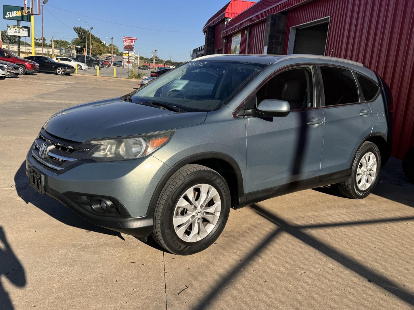 2012 BLUE HONDA CR-V EX-L EX-L 2WD 5-Speed AT (5J6RM3H73CL) with an 2.4L L4 DOHC 16V engine, 5-Speed Automatic transmission, located at 8101 E. Skelly Dr., Tulsa, OK, 74129, (918) 592-3593, 36.121891, -95.888802 - Photo#0