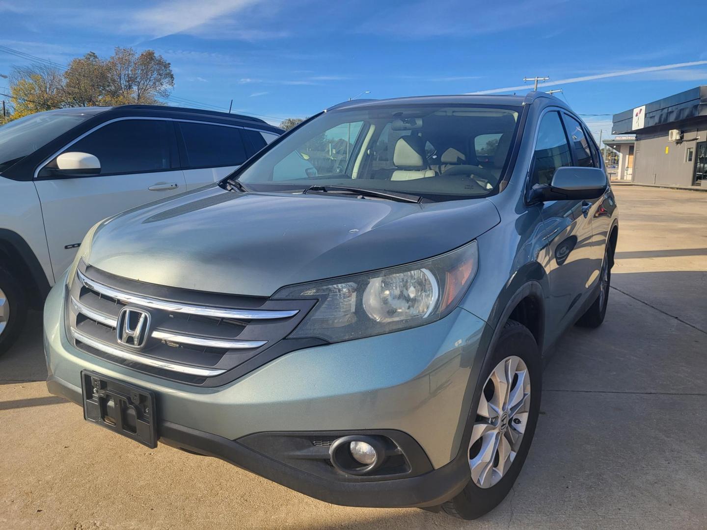 2012 BLUE HONDA CR-V EX-L EX-L 2WD 5-Speed AT (5J6RM3H73CL) with an 2.4L L4 DOHC 16V engine, 5-Speed Automatic transmission, located at 8101 E. Skelly Dr., Tulsa, OK, 74129, (918) 592-3593, 36.121891, -95.888802 - Photo#1