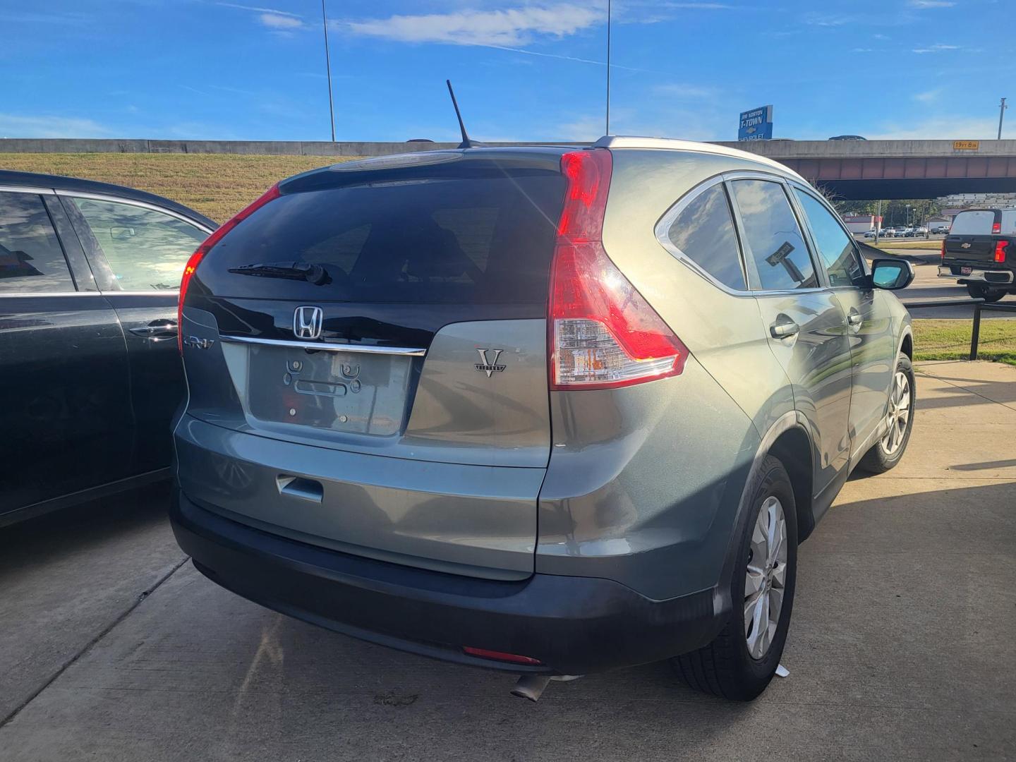 2012 BLUE HONDA CR-V EX-L EX-L 2WD 5-Speed AT (5J6RM3H73CL) with an 2.4L L4 DOHC 16V engine, 5-Speed Automatic transmission, located at 8101 E. Skelly Dr., Tulsa, OK, 74129, (918) 592-3593, 36.121891, -95.888802 - Photo#2