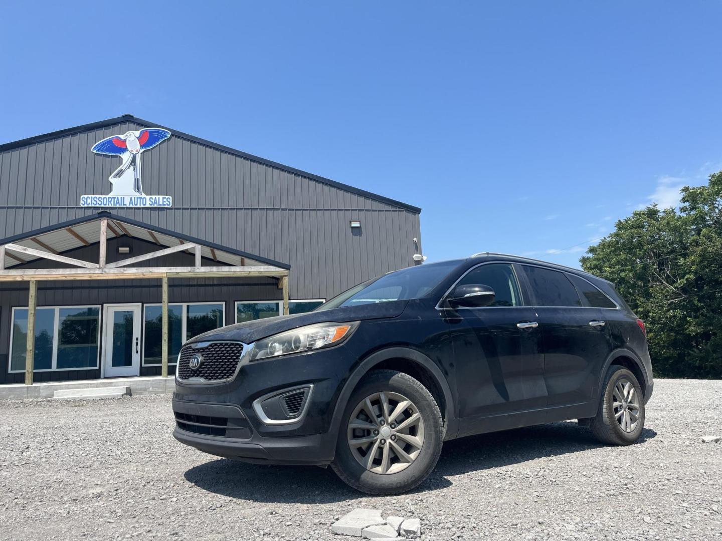 2016 BLACK Kia Sorento LX 2WD (5XYPG4A32GG) with an 2.4L L4 DOHC 16V engine, 6-Speed Automatic transmission, located at 8101 E. Skelly Dr., Tulsa, OK, 74129, (918) 592-3593, 36.121891, -95.888802 - Photo#0