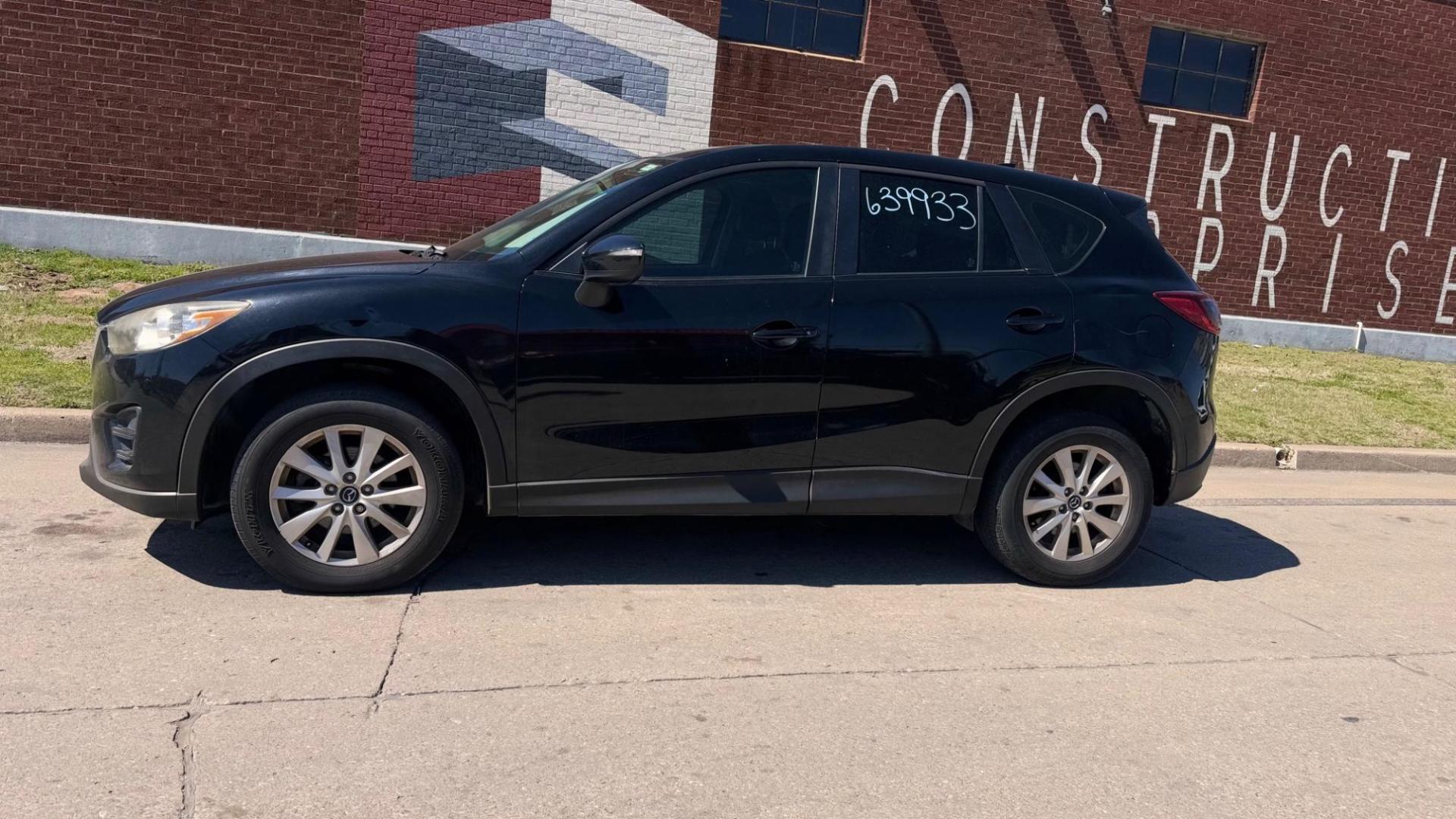 2016 BLACK Mazda CX-5 Sport AT (JM3KE2BY8G0) with an 2.5L L4 DOHC 16V engine, 6-Speed Automatic transmission, located at 8101 E. Skelly Dr., Tulsa, OK, 74129, (918) 592-3593, 36.121891, -95.888802 - Photo#0
