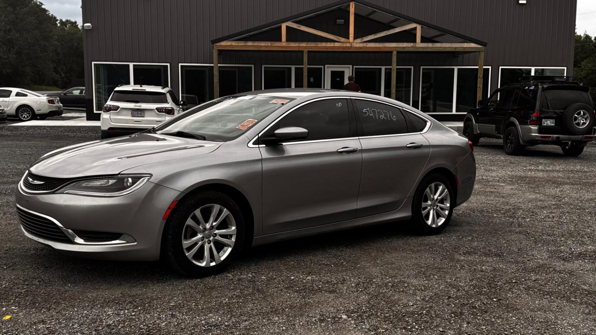 2015 SILVER Chrysler 200 Limited (1C3CCCAB4FN) with an 2.4L L4 DOHC 16V engine, 9-Speed Automatic transmission, located at 8101 E. Skelly Dr., Tulsa, OK, 74129, (918) 592-3593, 36.121891, -95.888802 - Photo#0
