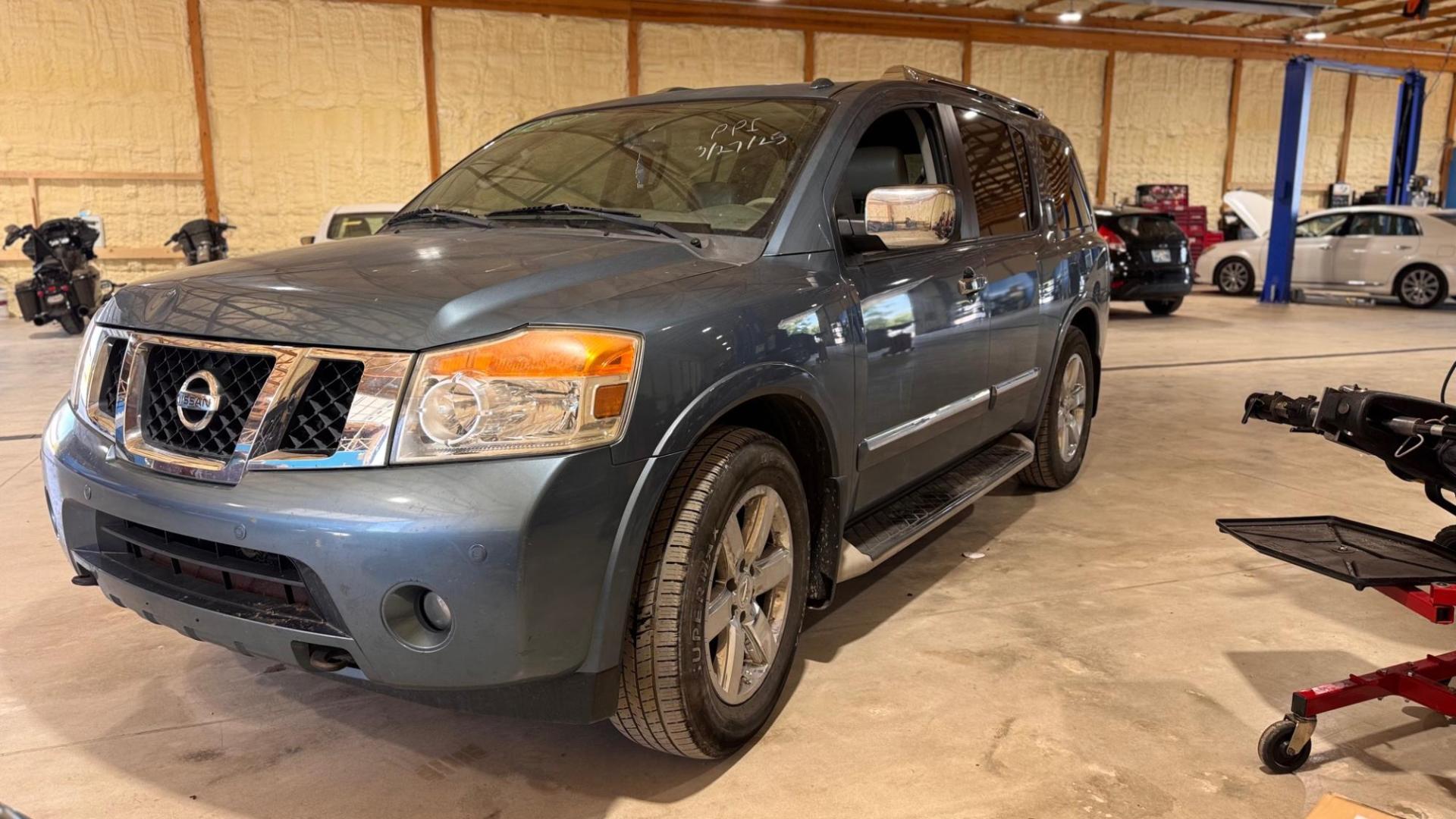 2010 BLUE Nissan Armada Platinum 2WD (5N1BA0NF5AN) with an 5.6L V8 DOHC 32V FFV engine, 5-Speed Automatic transmission, located at 8101 E. Skelly Dr., Tulsa, OK, 74129, (918) 592-3593, 36.121891, -95.888802 - Photo#0