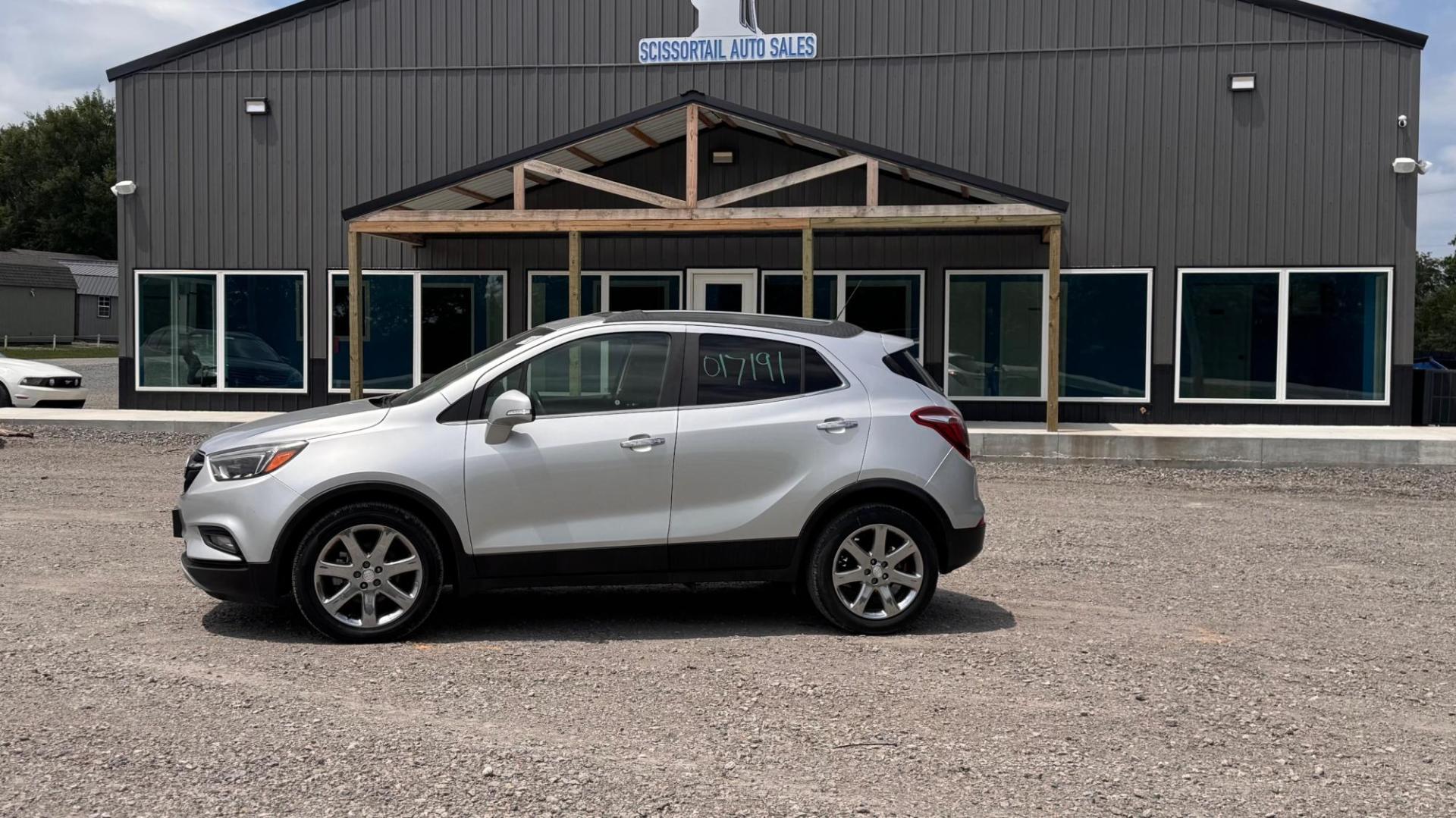 2017 SILVER Buick Encore Essence FWD (KL4CJCSB0HB) with an 1.4L L4 DOHC 16V TURBO engine, 6A transmission, located at 8101 E. Skelly Dr., Tulsa, OK, 74129, (918) 592-3593, 36.121891, -95.888802 - Photo#0